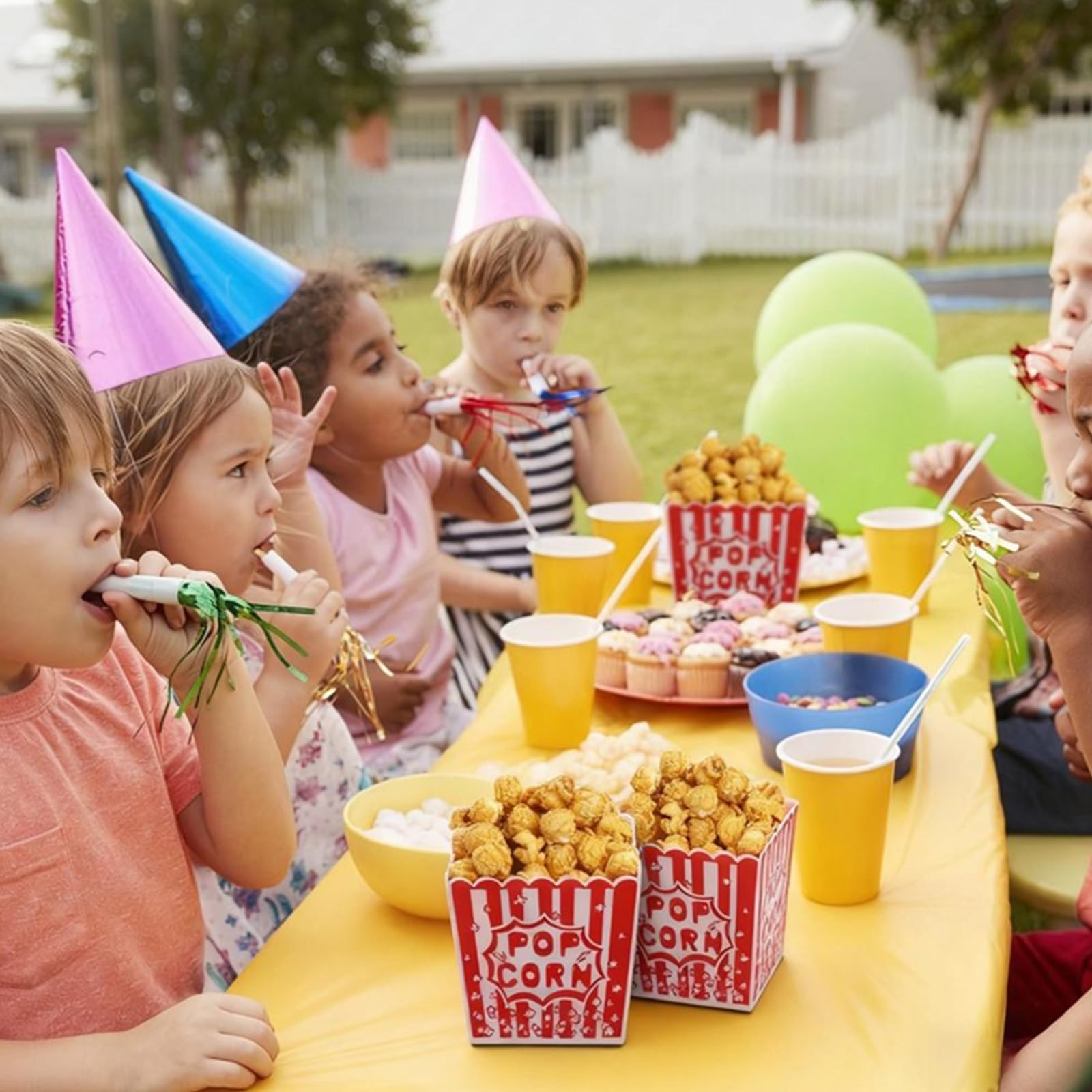 Tebery party snack boxes serving guests with popcorn and more.