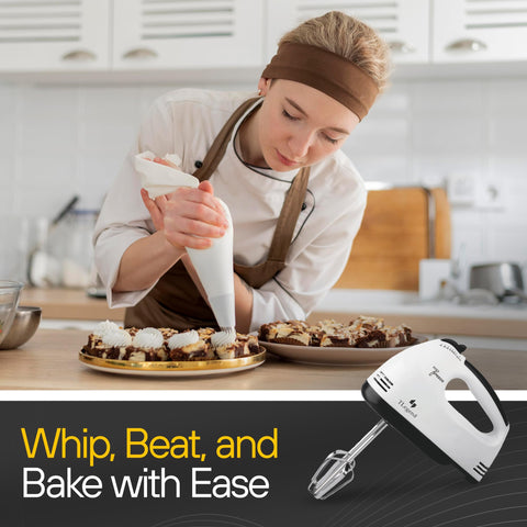 TechnoLegend hand mixer red in-use during cake batter preparation