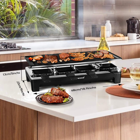 Techwood Raclette Grill eight cheese-pans for melting cheese and sauces.