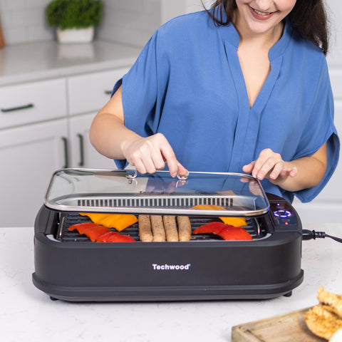 Techwood removable drip tray captures grease for healthier grilling