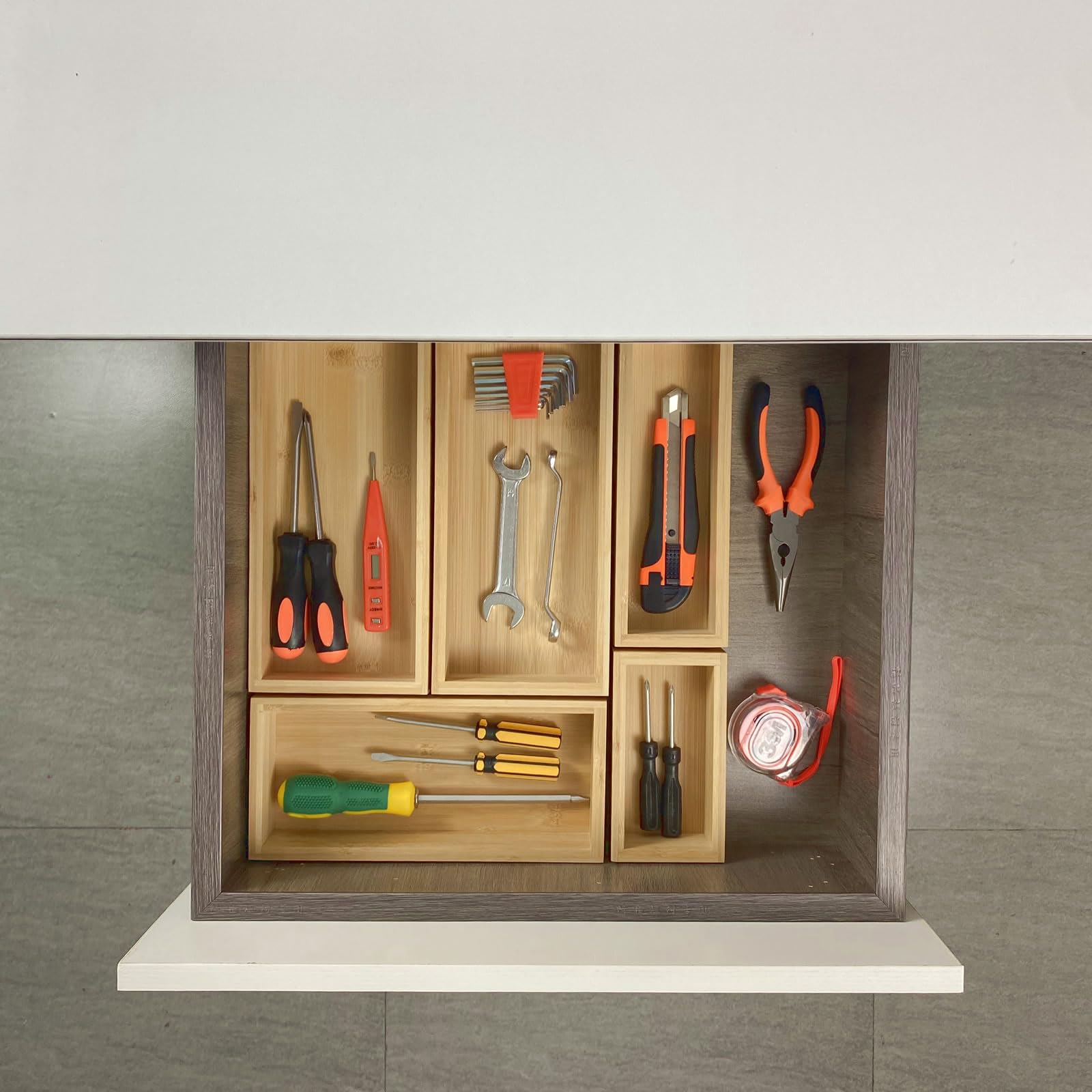 Teicui knife drawer organizer in natural bamboo for blade storage.