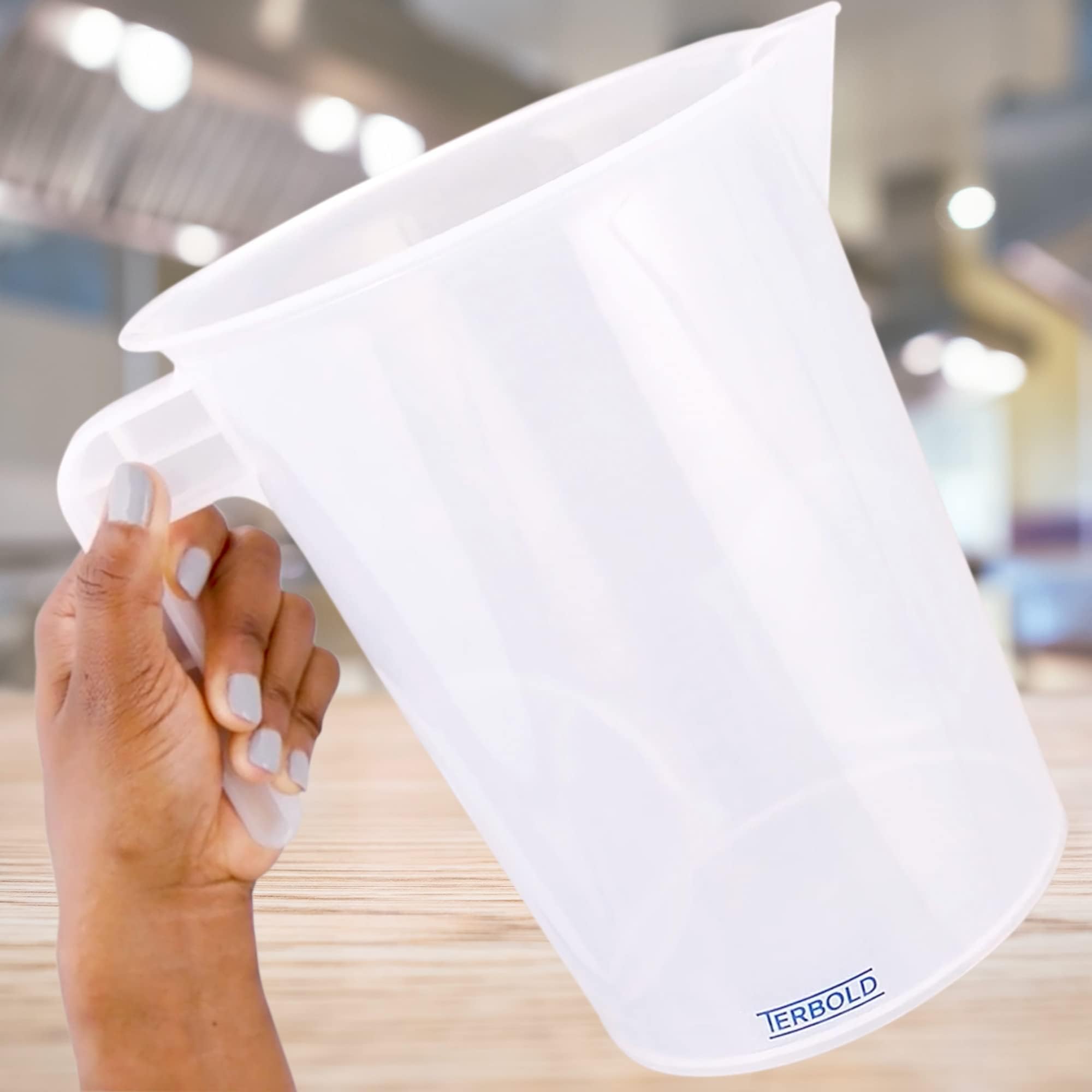 Terbold spill-free pouring spout reduces mess during transfers
