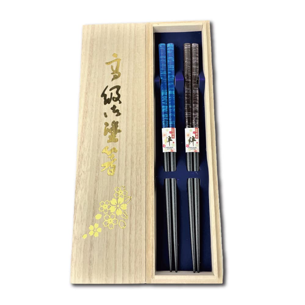 Terra Distribution premium lacquered chopsticks in use, refined finish for elegant dining.