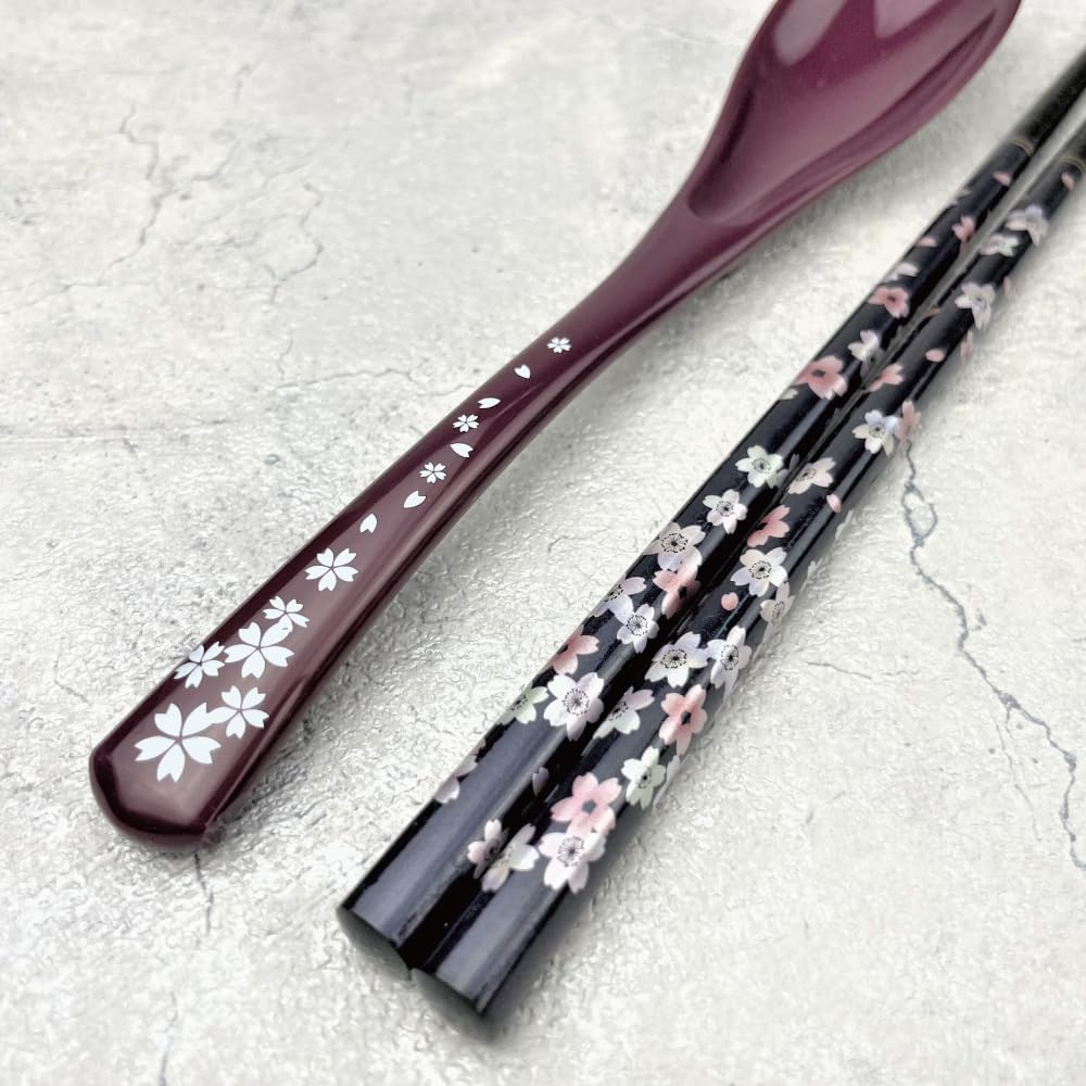 Terra Distribution lacquered spoon featuring ergonomic design for easy scooping.