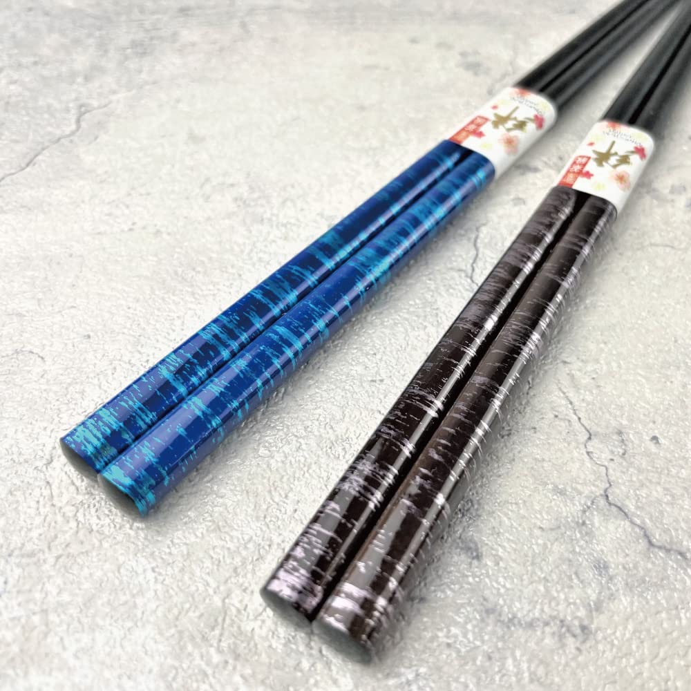 Terra Distribution splashed pattern lacquer art on chopsticks enhances table appeal.