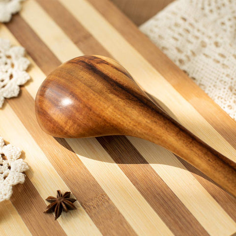 TEZZ natural acacia wood grain adds warmth to kitchen.