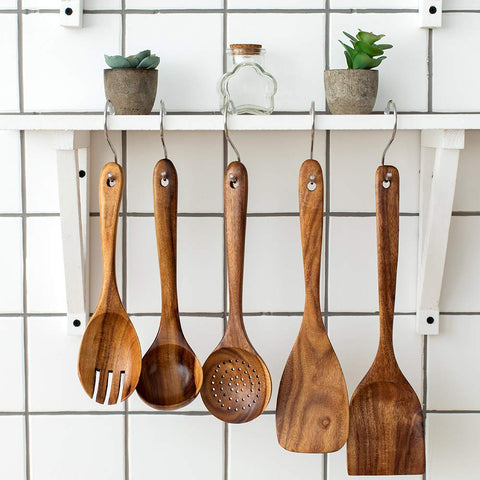 TEZZ wooden skimmer lifts foods from hot liquids safely.