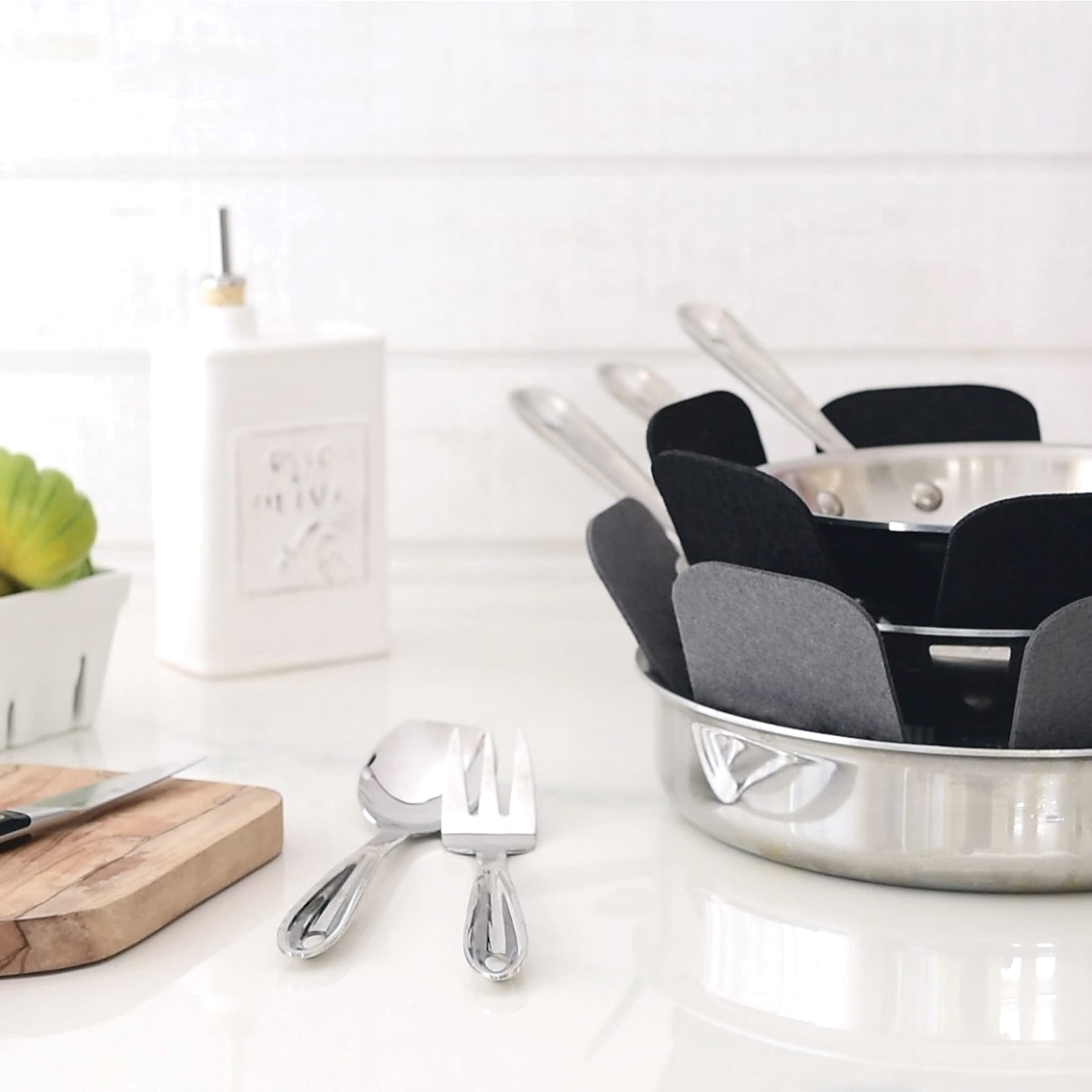 Durable polyester guards from T-Fal adaptable to various cookware surfaces