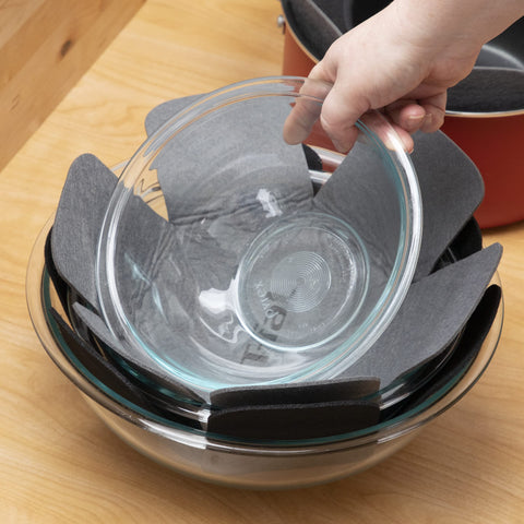 T-Fal protectors in a stack setup show organized kitchen storage