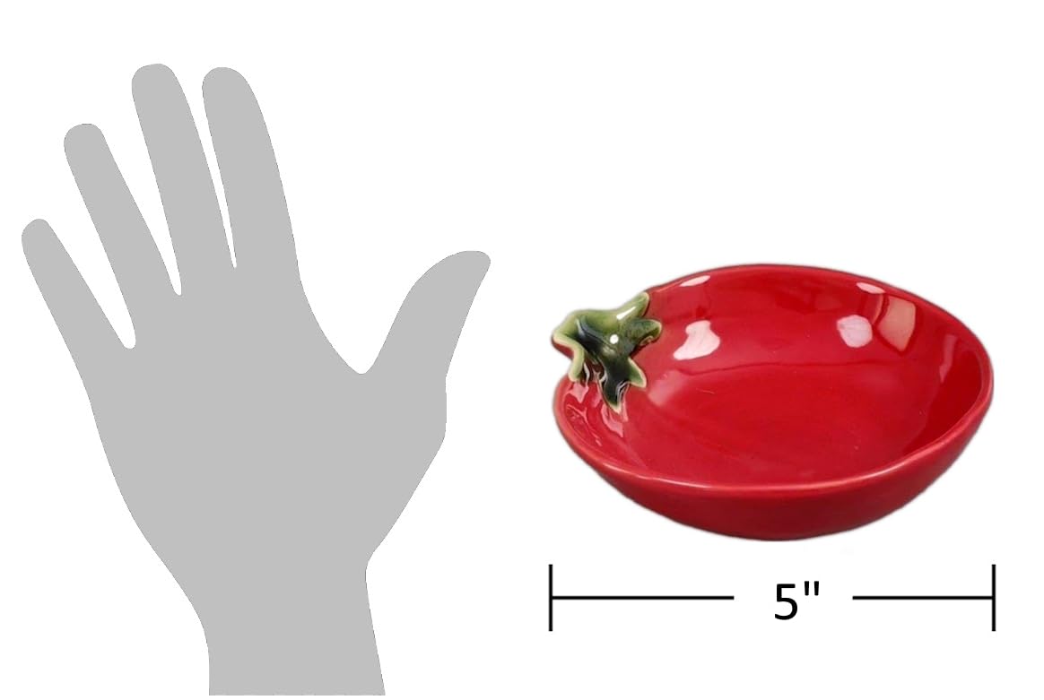 Tomato-inspired spoon rest enhances stovetop organization and table presentation.