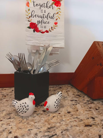 The Bridge Collection high-gloss ceramic finish catches light for a bright kitchen accent.