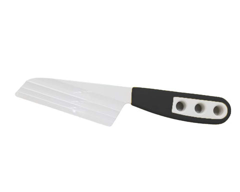 The Cheese Knife BKP2 with patented blade demonstrates clean cuts and cheese staying on the plate.
