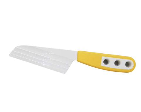 The Cheese Knife OKP2 with patented blade and yellow handle, keeps cheese on the plate for clean cuts.