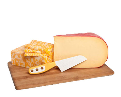 The Cheese Knife OKP2 with soft grip, yellow handle, comfortable slicing during casual cheeseboards.