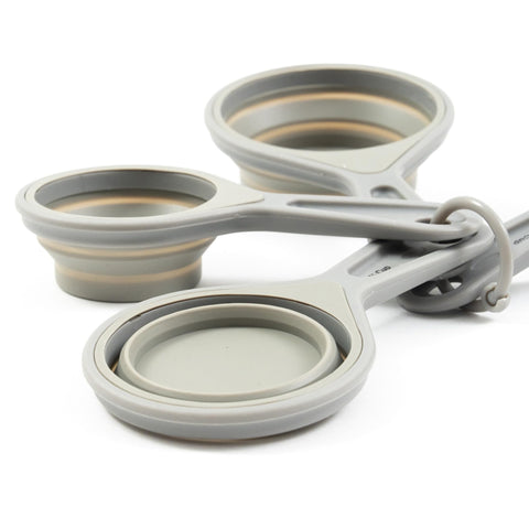 The French Culinary Institute 1/3-cup gray cup extended for consistent sizing.