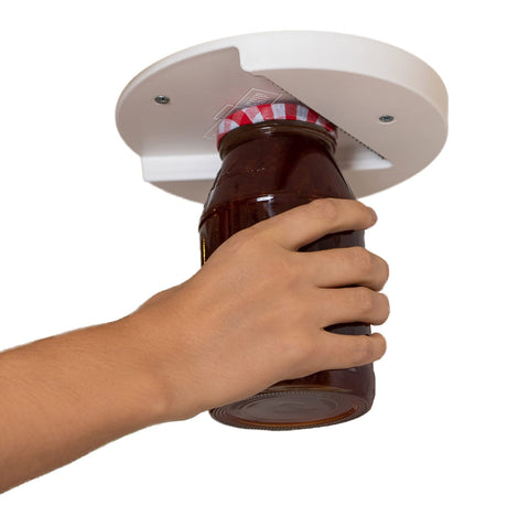 The G Grip under-cabinet jar opener mount demonstrates secure mounting for easy lids.