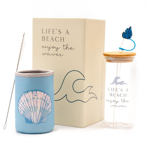 The Love Crate Co. Ocean Gifts glass tumbler with lid and straw keeps beverages cool on the go.