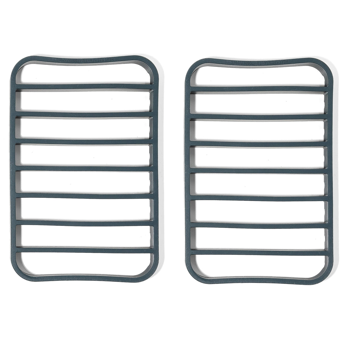 The Silicone Kitchen navy roasting rack on a quarter-sheet pan for even airflow.