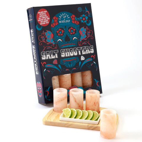 The Spice Lab pink Himalayan salt tequila shot glasses in a tray for entertaining.