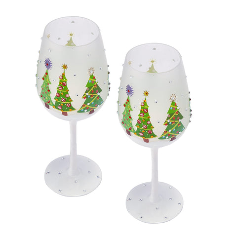 The Wine Savant ornate Christmas-tree glass collection enhances festive table styling.