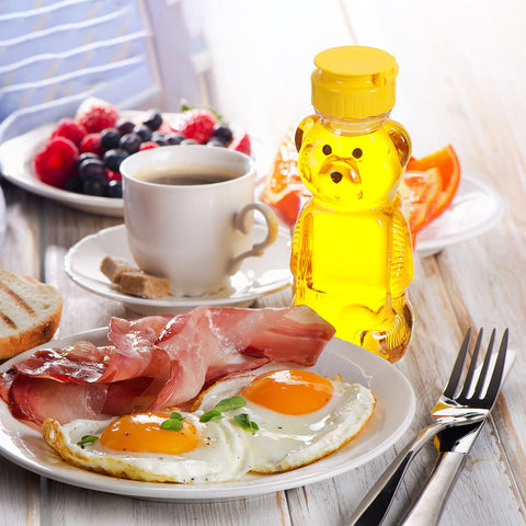 Thenshop syrup-dispensing bear container supports mess-free cookies and desserts.