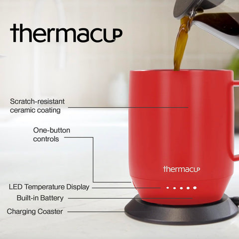 THERMACUP ergonomic stainless steel mug with comfortable handle in use at a desk.