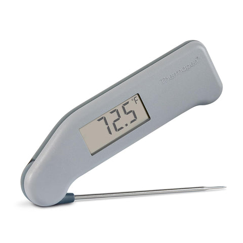 ThermoWorks Thermapen Dove Grey performs a quick read for precise meat temperatures.