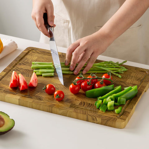 thetchry teak cutting board is easy to clean and keeps counters tidy after meals.