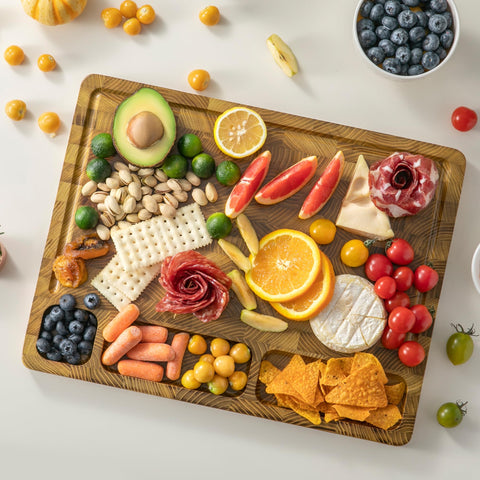 thetchry cutting board features a built-in handle for easy transport