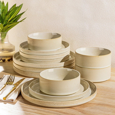 TheTerra ceramic dinnerware plates with speckled glaze for everyday dining and easy cleaning.