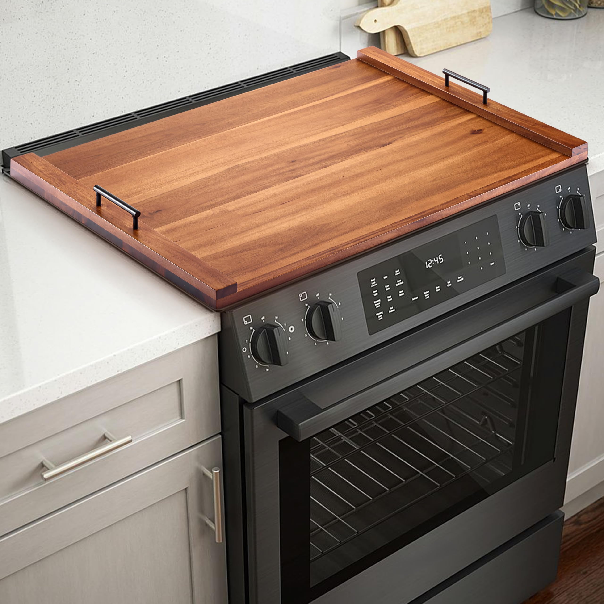 Tidita acacia wood stove top cover adds extra counter space for meal prep.