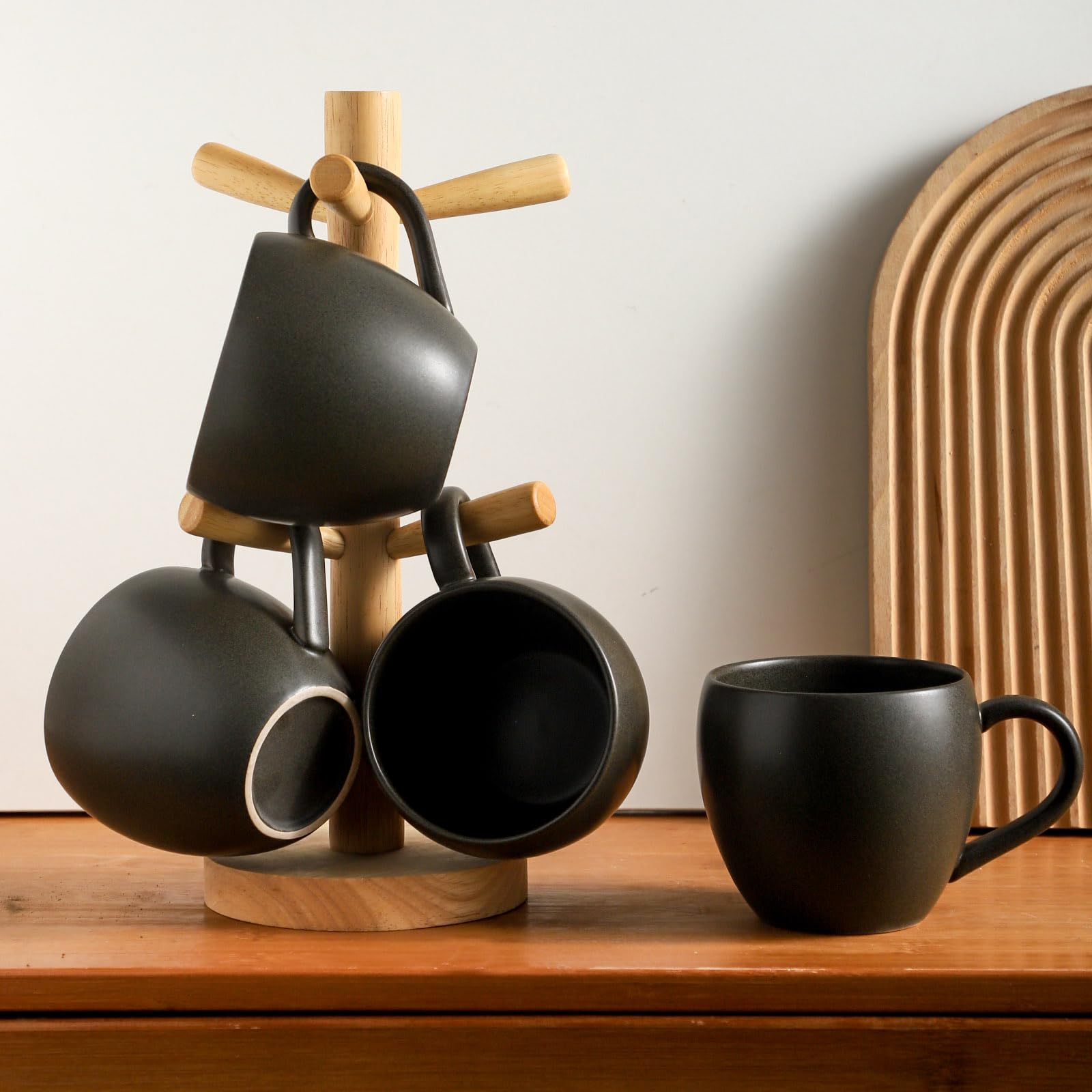 Tikooere black glaze coordinates with diverse kitchen decor.