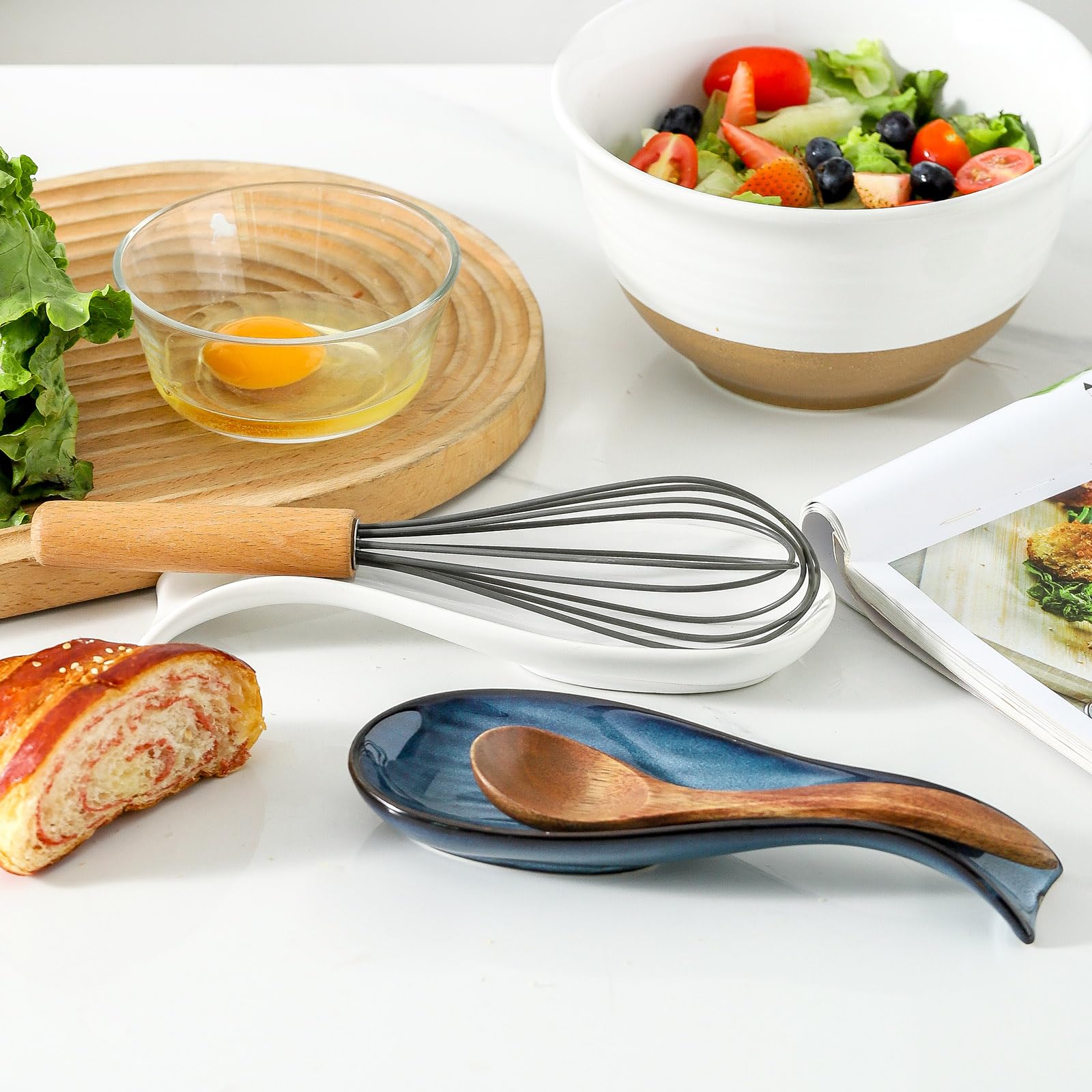Tikooere kitchen accessory holds rings, keys, and tea bags near the stove.