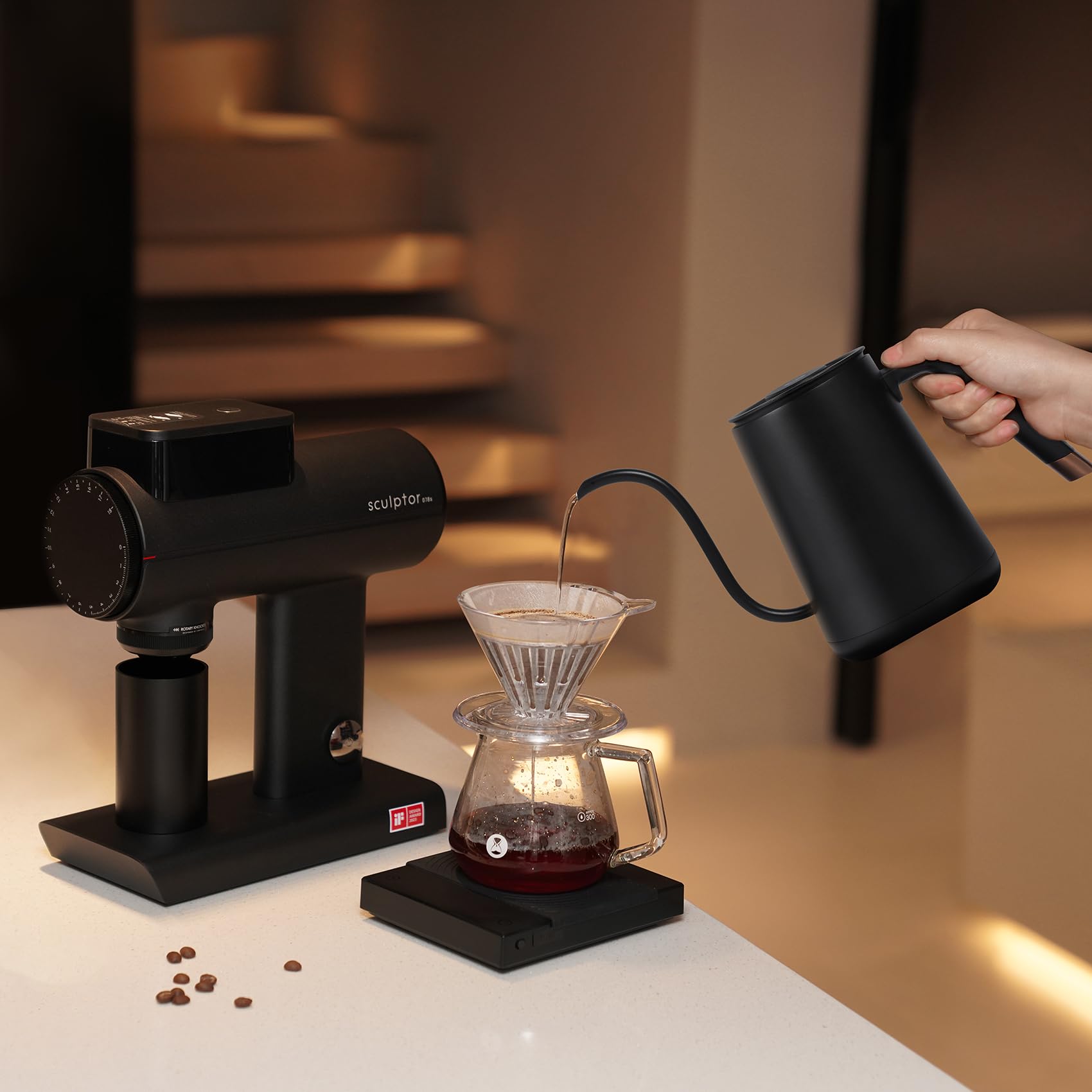 TIMEMORE Fish Smart Kettle beside tea setup for versatile brewing
