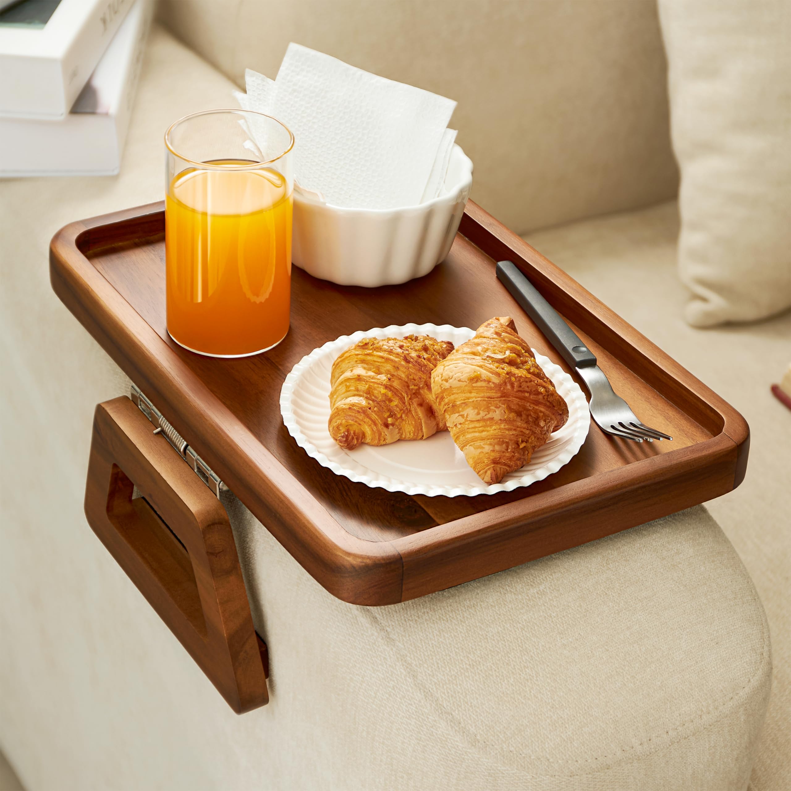 Tinamo acacia couch arm table clipped on for snacks and drinks.