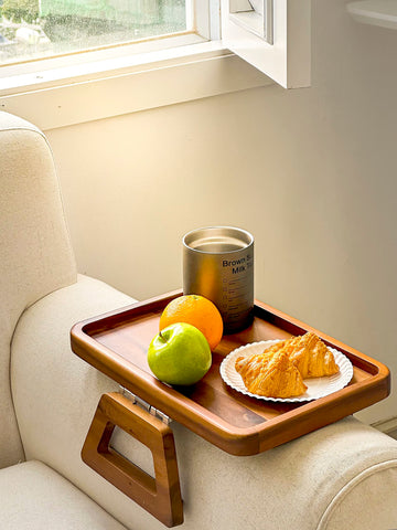 Tinamo compact tray stores neatly behind the sofa when not in use.
