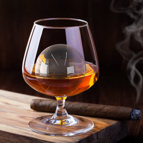 TINANA crystal-clear ice balls showcased in a whiskey glass
