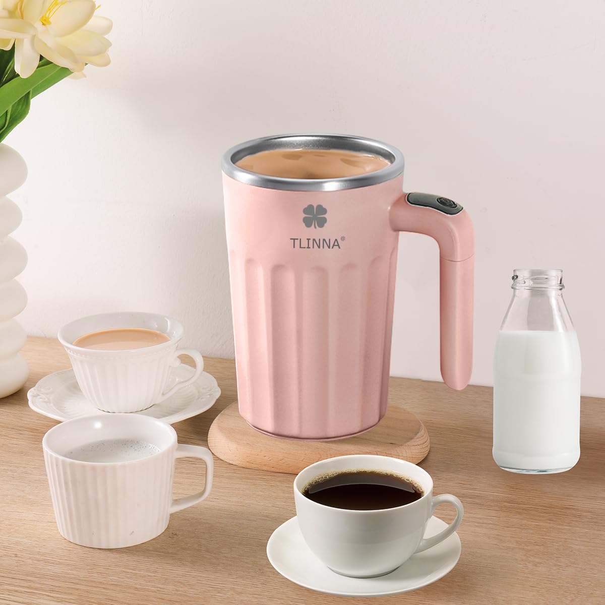 TLINNA self-stirring mug in car for on-the-go beverages.