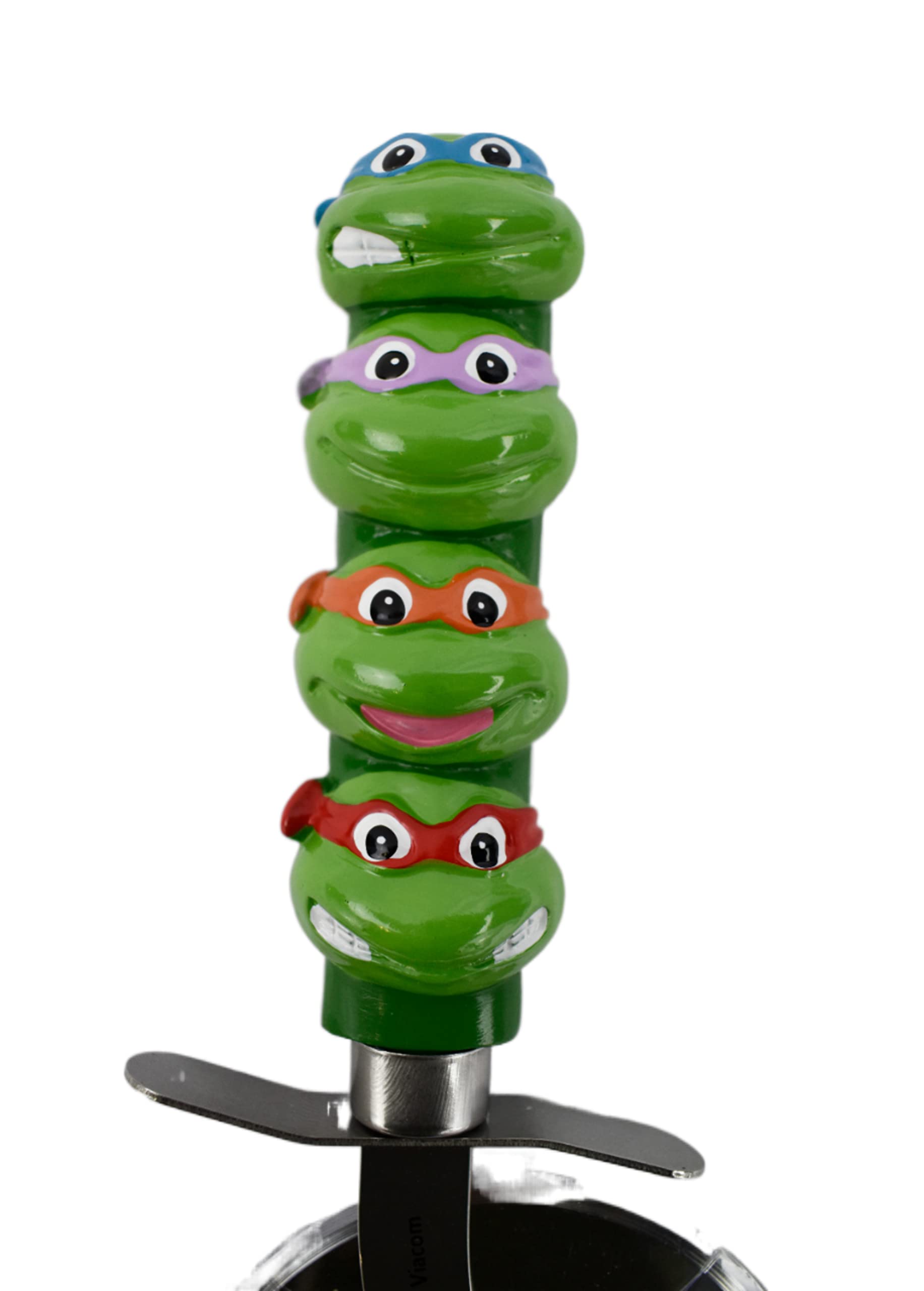TMNT pizza cutter with Michelangelo figure on the handle for family fun
