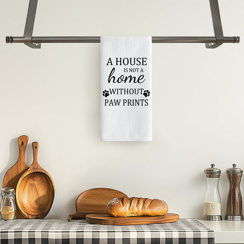 TNUW paw prints kitchen towel shown as decorative accent.