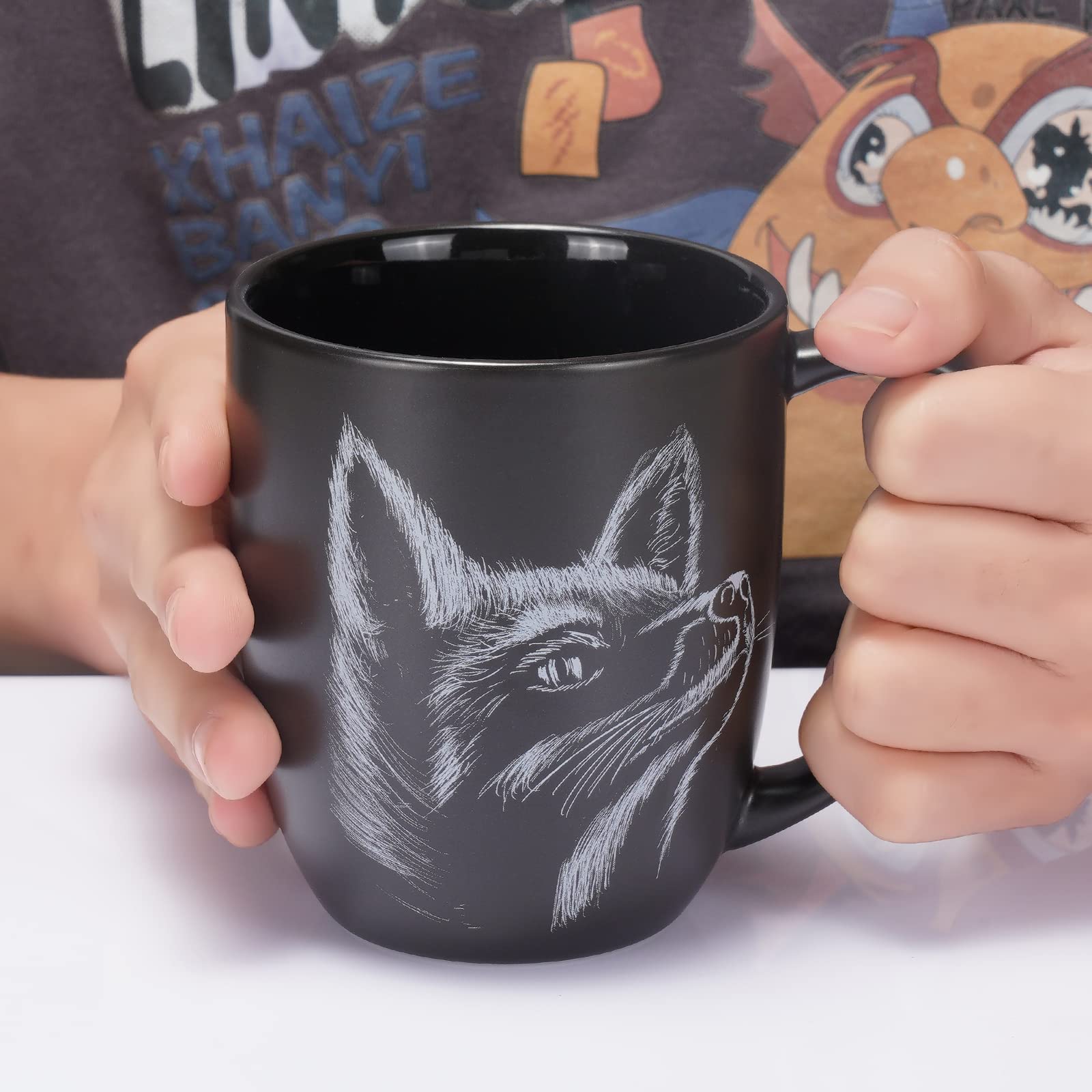 ToCooTo fox mug set on table with coffee steam rising.