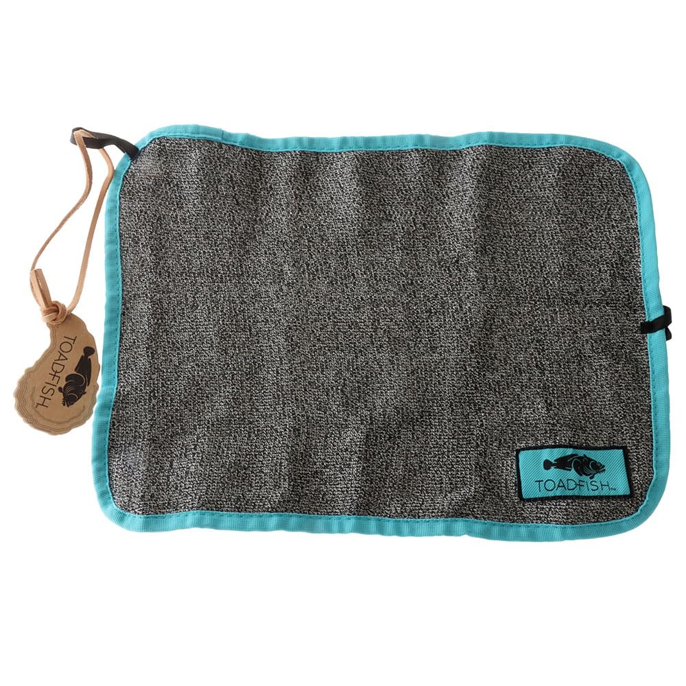 Toadfish Cut-proof Shucking Cloth in action for outdoor shellfish prep