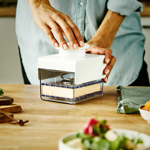 TofuBud Tofu Press packaging with healthy recipes cookbook.