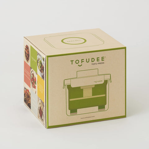 TOFUDEE tofu being pressed to achieve firmer texture