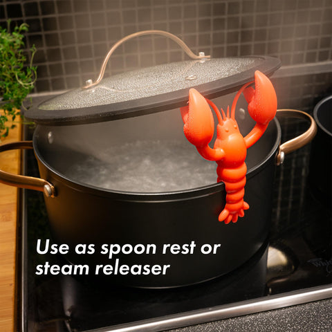 tögö Lobster silicone utensil rest showcases bright red color for cheerful kitchen decor.