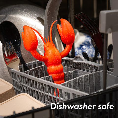 tögö Lobster silicone utensil rest on stovetop steady, non-slip design.
