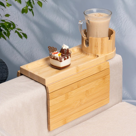 Tomlyop couch arm tray on a wide armrest keeping snacks within reach.