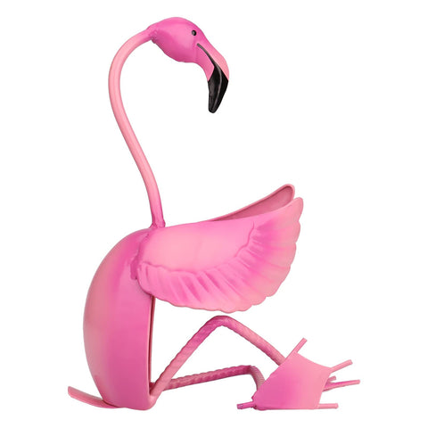 Tooarts flamingo sculpture doubles as a stylish dining room accent.