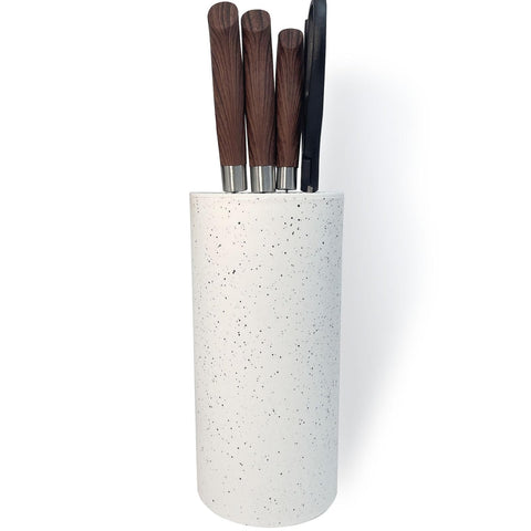 Toosbuc multi-purpose holder can become a vase or storage bucket.