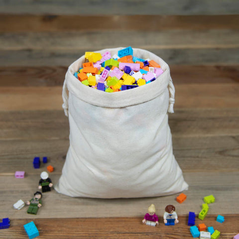 TOPDesign drawstring muslin bag used for grains and spices, eco-friendly storage.
